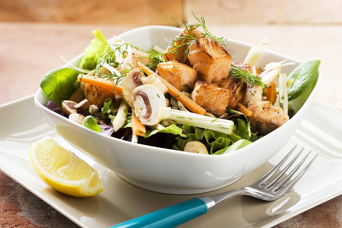 Salmon salad with mushrooms and carrots