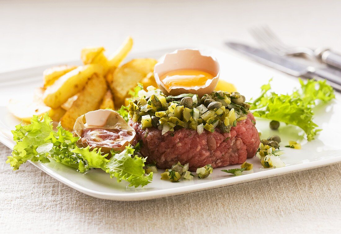 Beef tartar with capers, onions and egg