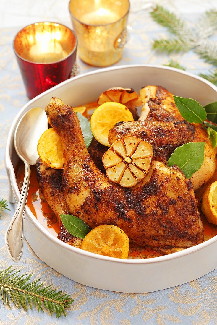 Roast chicken with lemons, garlic and bay leaves