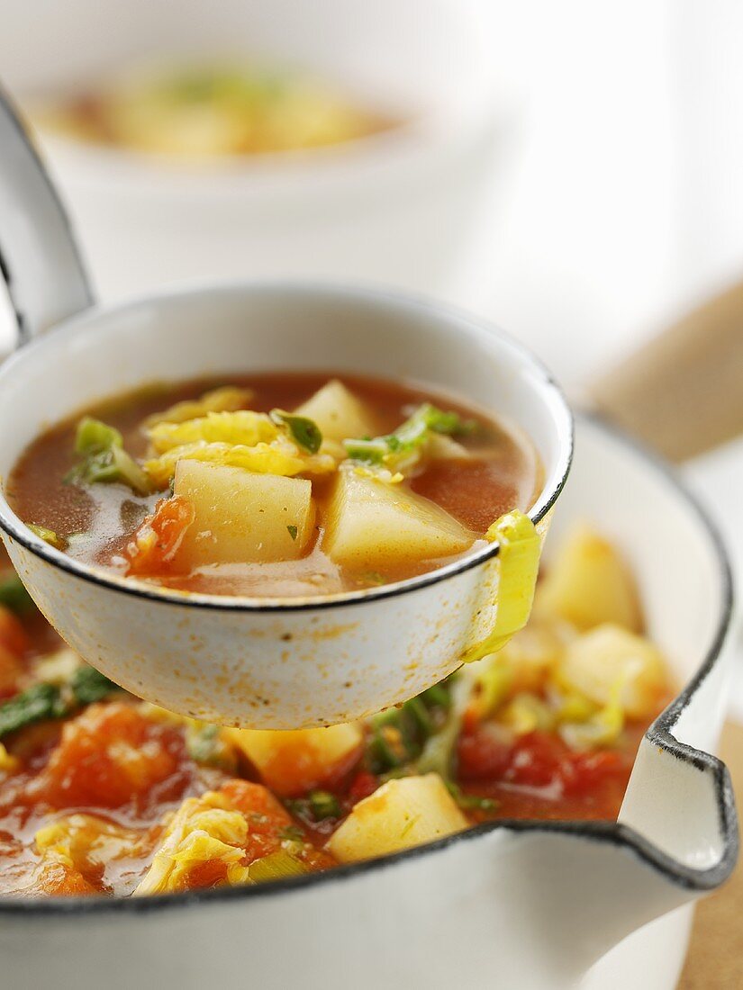 Vegetable soup with potatoes and tomatoes