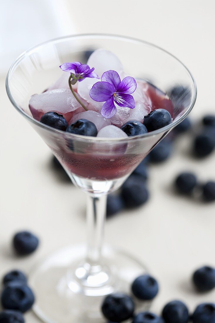 Violet liqueur with blueberries and scented violets