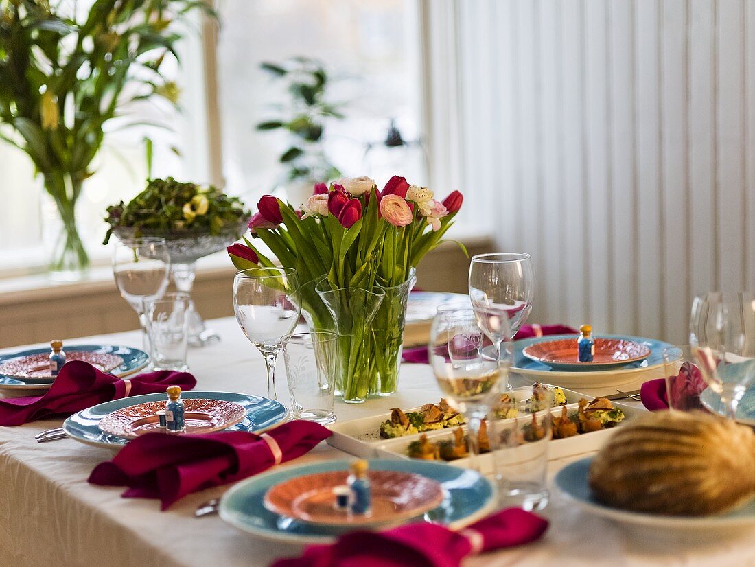 A festively decorated table with spring flowers