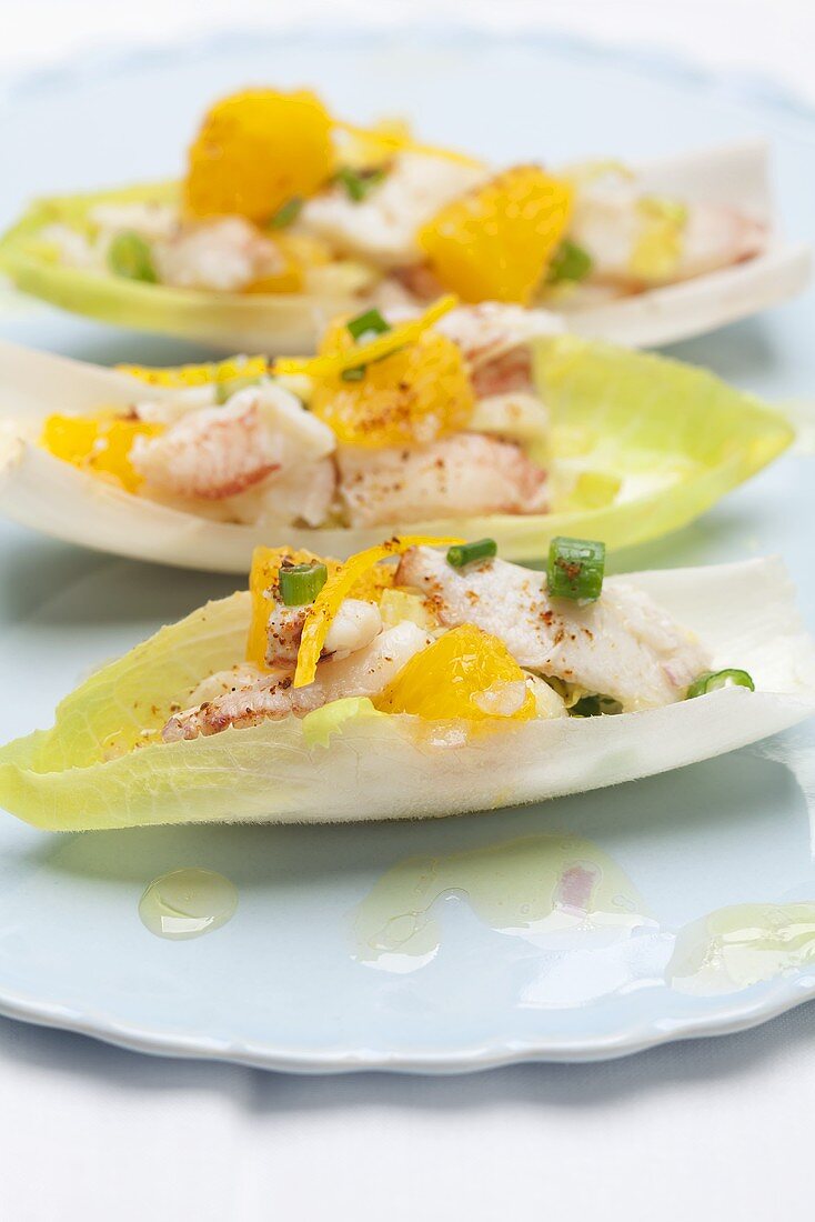 Chicory boats with a crab and orange salad
