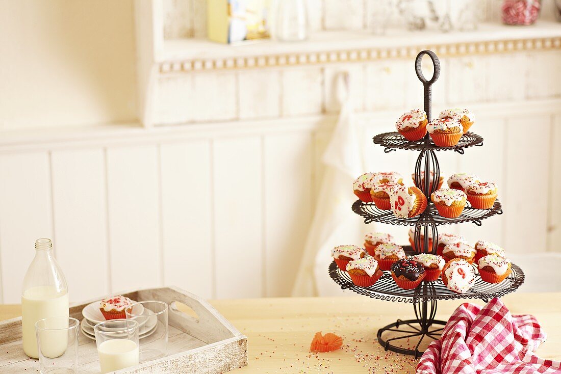 Advent calendar cupcakes on a cake stand