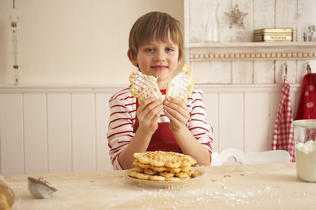 A child holding an advent waffle