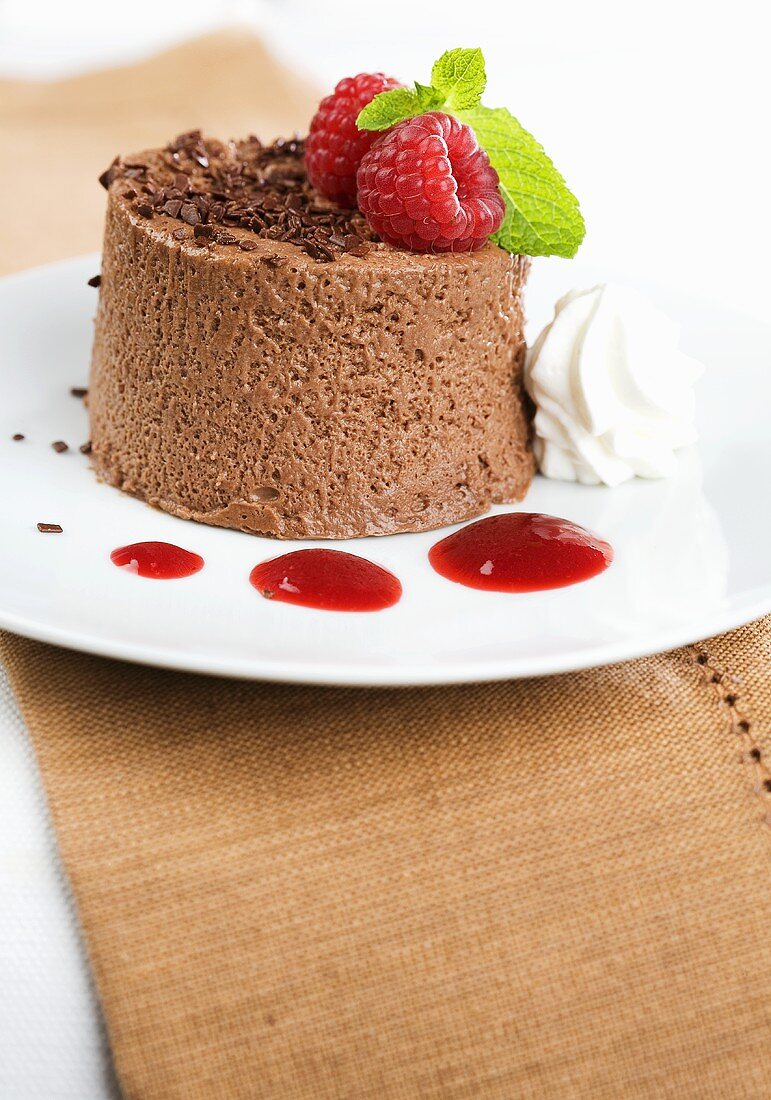 Chocolate mousse with raspberry sauce
