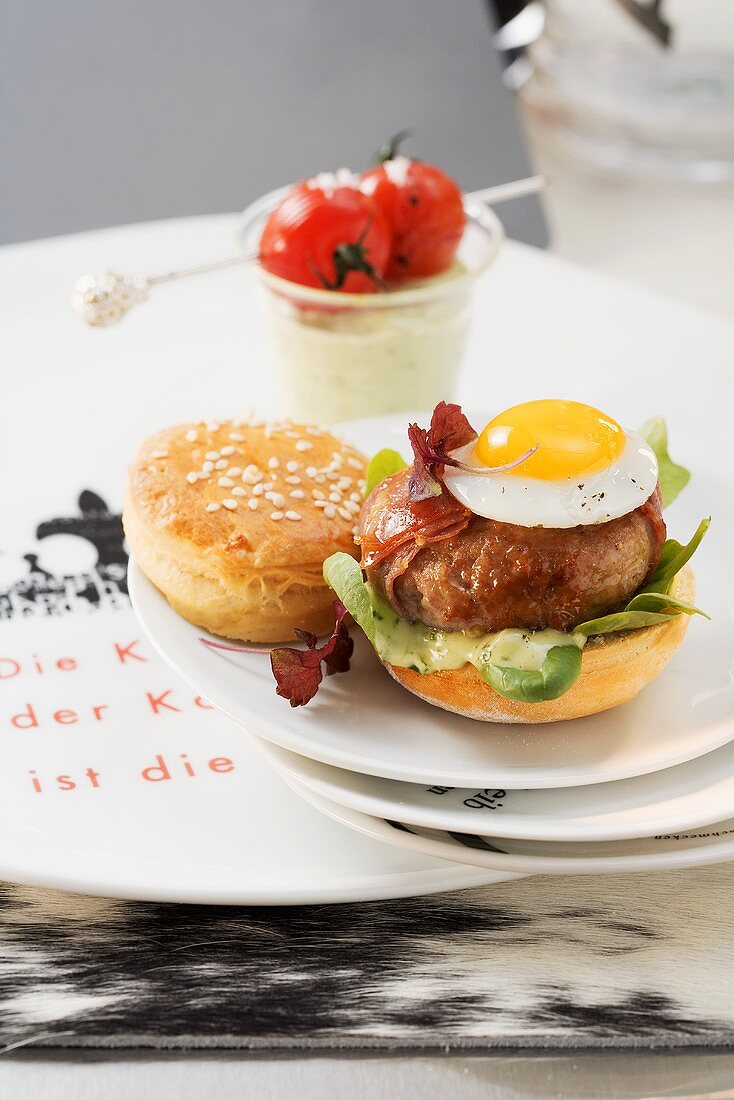 A veal burger with a quail's egg