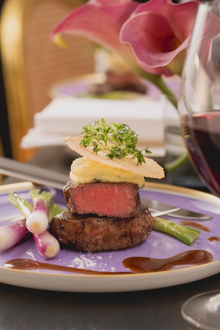 Beef fillet with potato and olive oil cream and Parmesan slices
