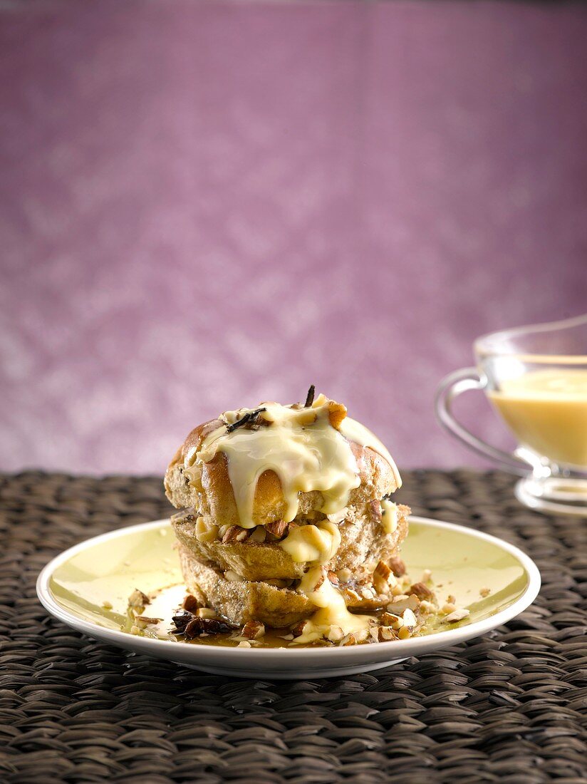 Hot cross buns filled with nuts and vanilla syrup