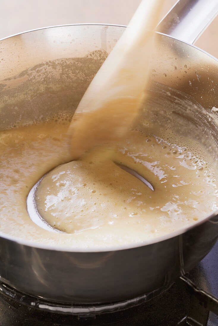 Bechamel sauce being made