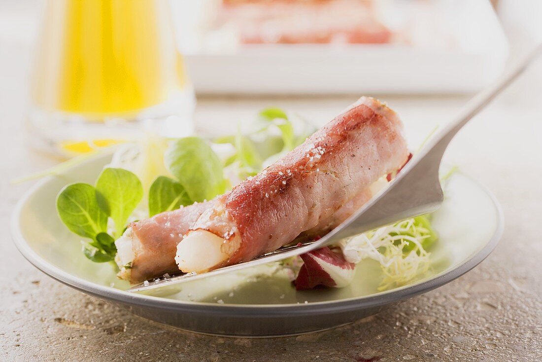 Black salsify and ham rolls with a winter salad