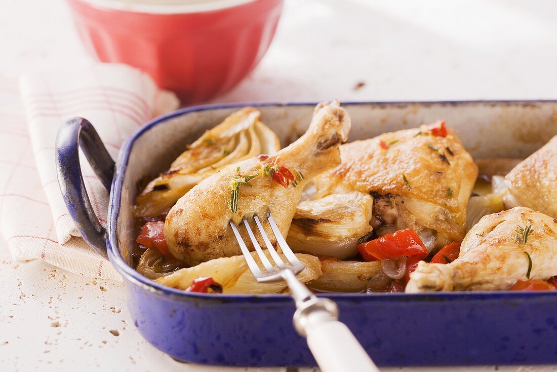 Chicken legs on a fennel and tomato medley