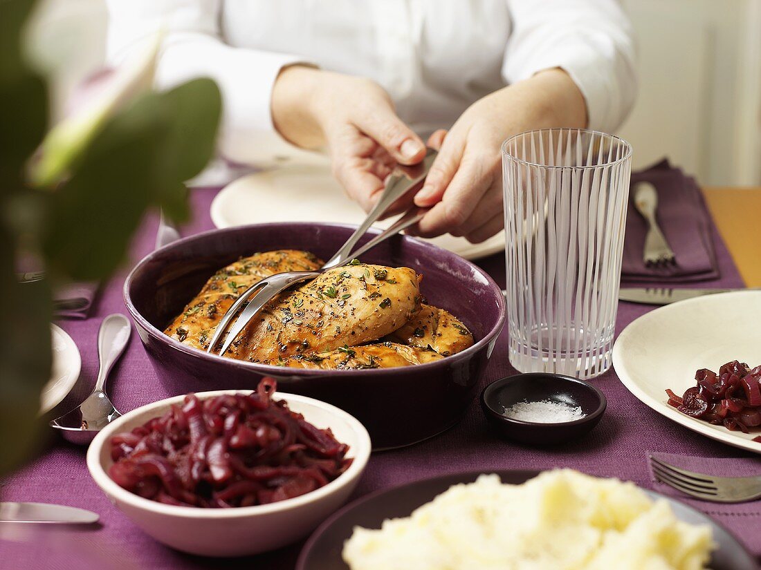 Glazed chicken breast with red onions