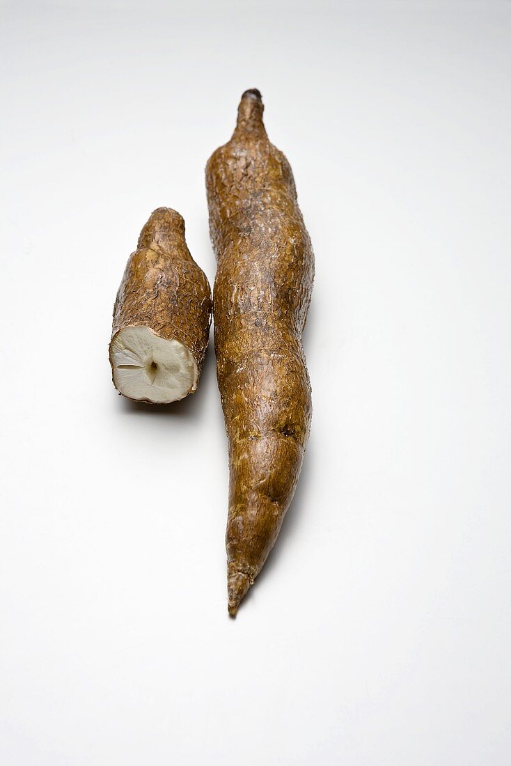 One whole cassava root and half of a root