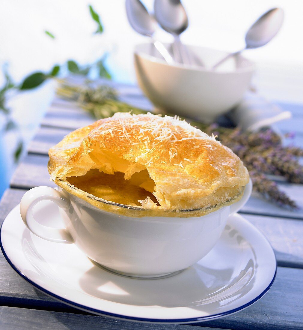 Onion soup with puff pastry crust