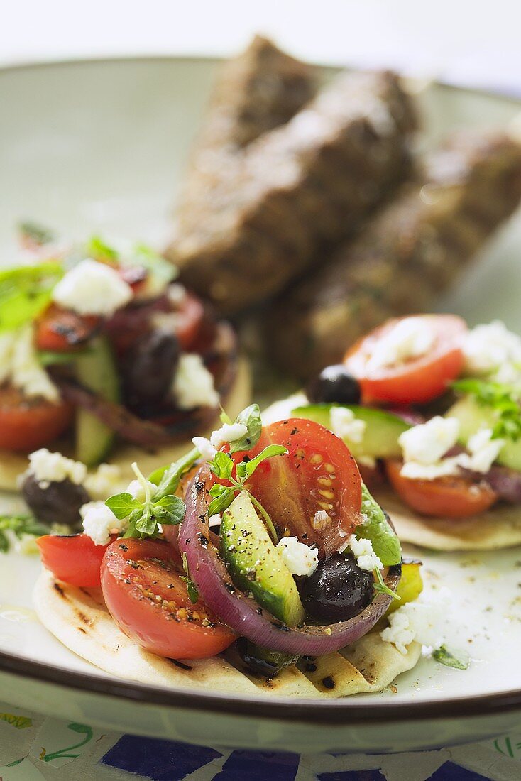 Mini-tortillas topped with tomato salad