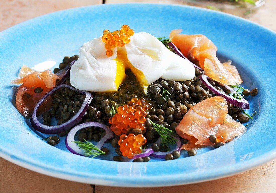 Lentil salad with smoked salmon, poached egg and caviar