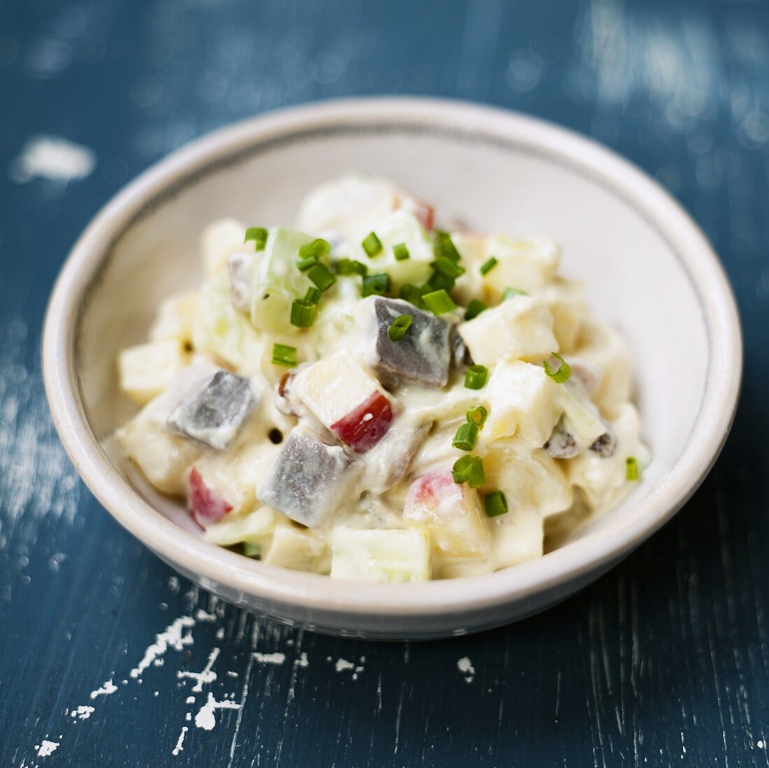 Potato, herring and apple salad with chives