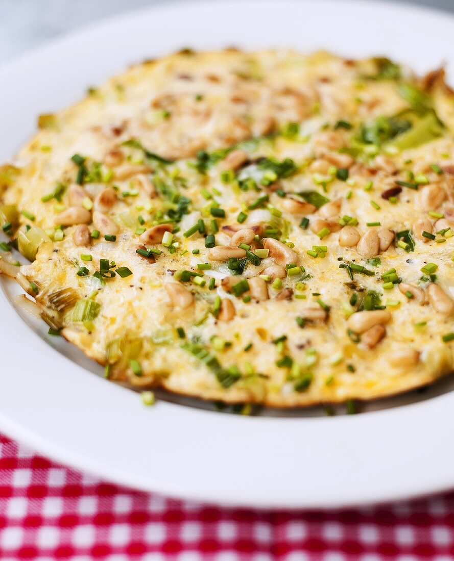 Herb omelette with pine nuts