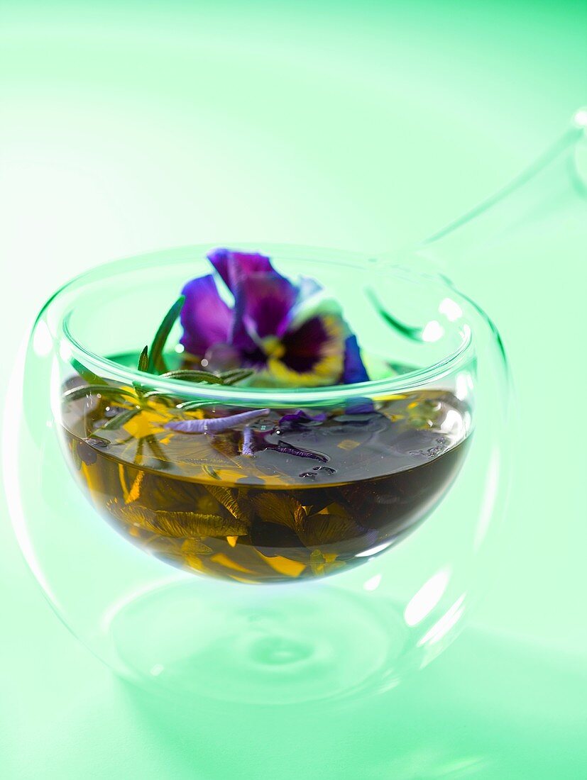 Olive oil flavoured with herbs and edible flowers