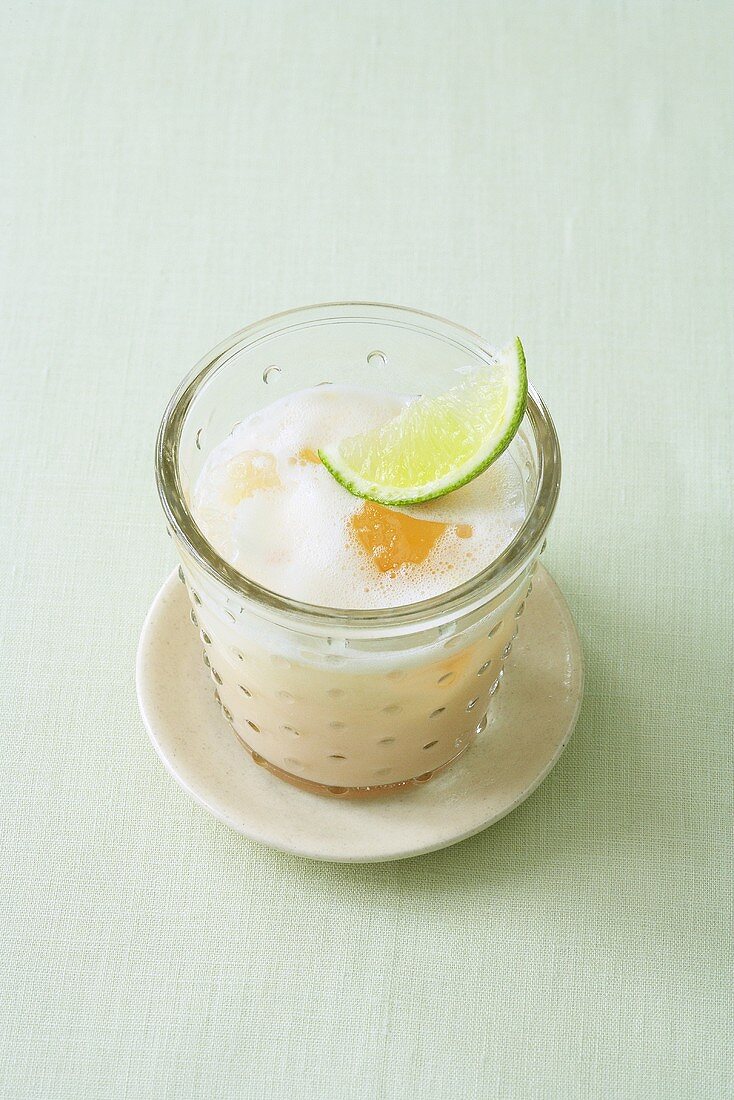 Buttermilk drink with citrus fruit and banana
