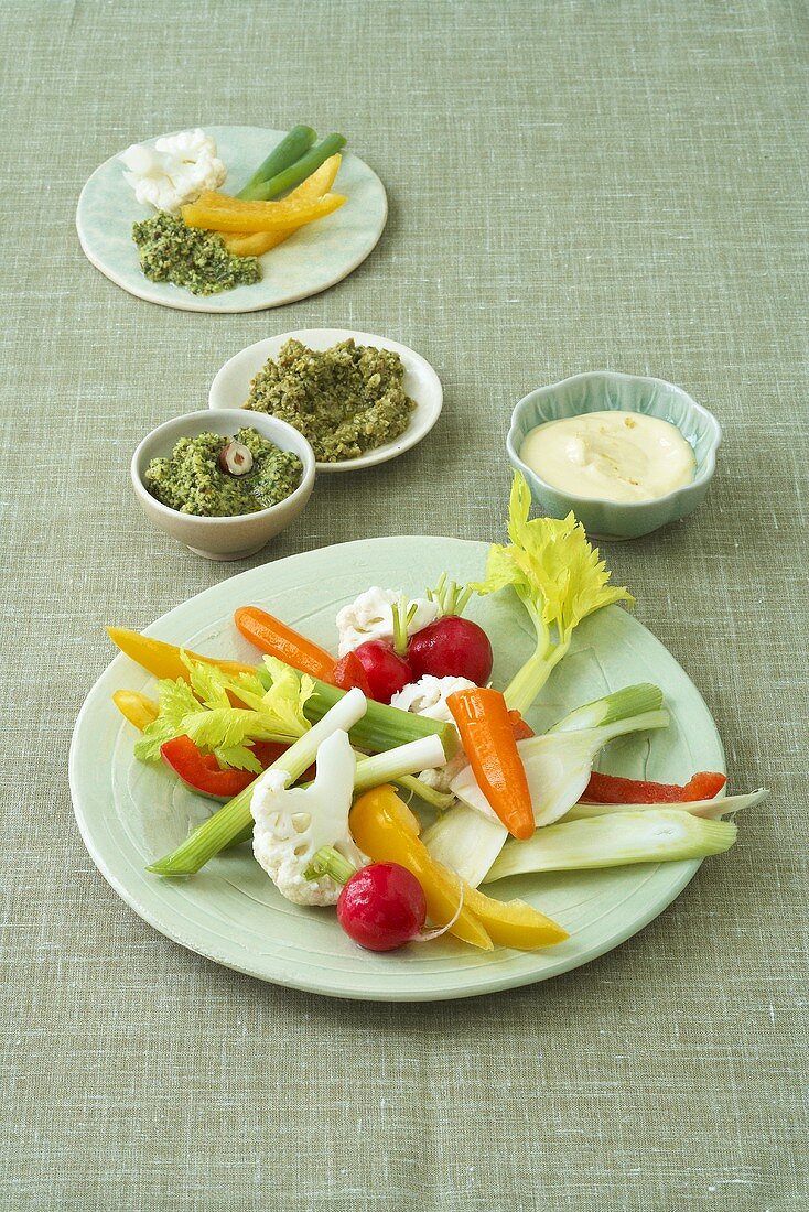 Plate of vegetables with pesto and mayonnaise for dipping