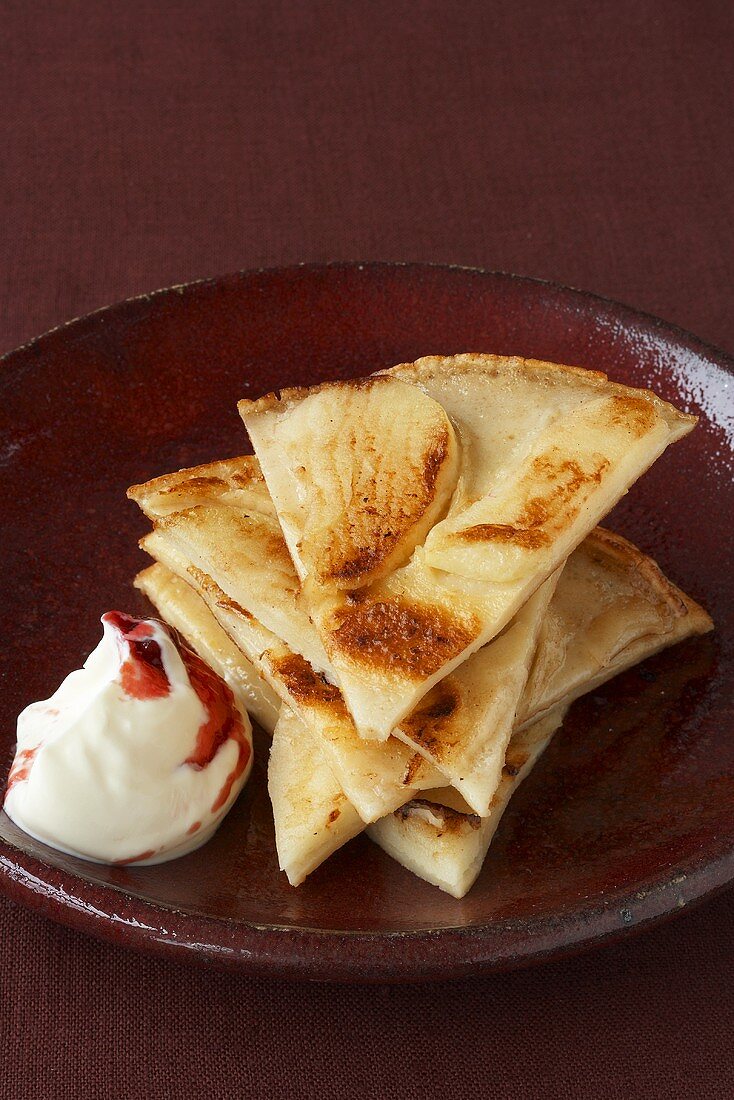 Apple pancakes with cranberry crème fraîche