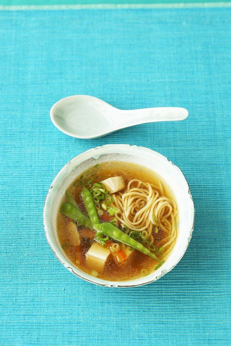 Asian noodle soup with tofu and vegetables