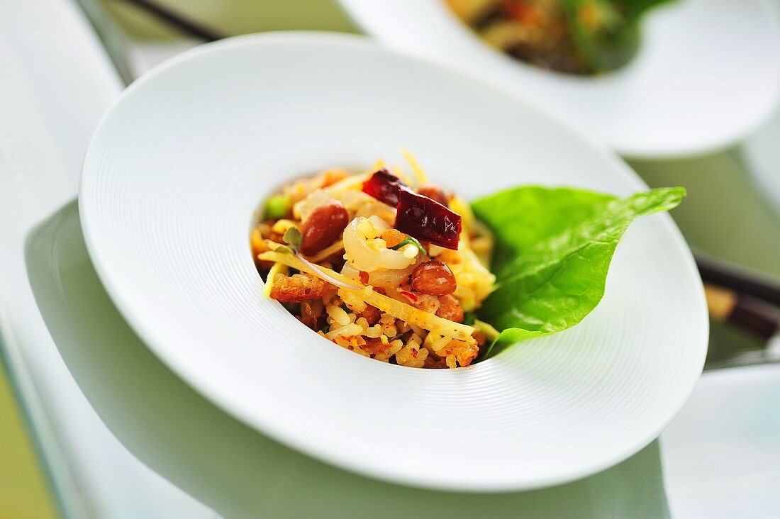 Rice salad with pork skin, mango and chillies (Thailand)