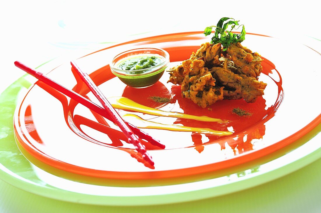 Pakoras (Vegetable fritters made with chick-pea flour batter)