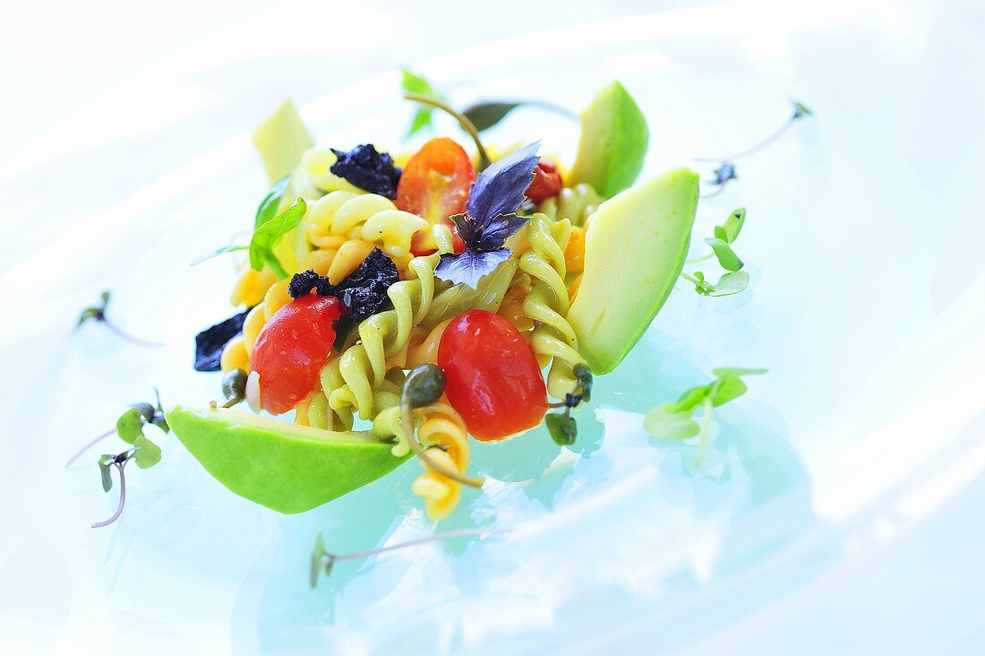 Pasta salad with cherry tomatoes and avocado