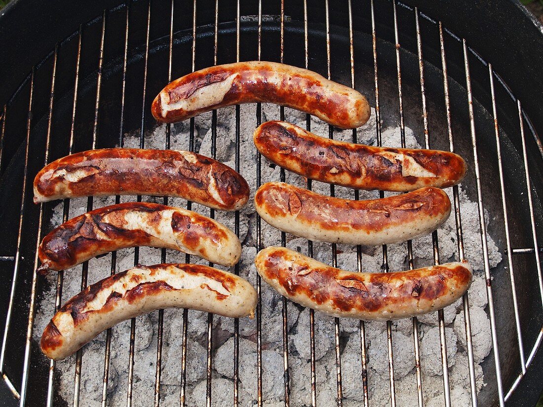 Sausages on charcoal barbecue