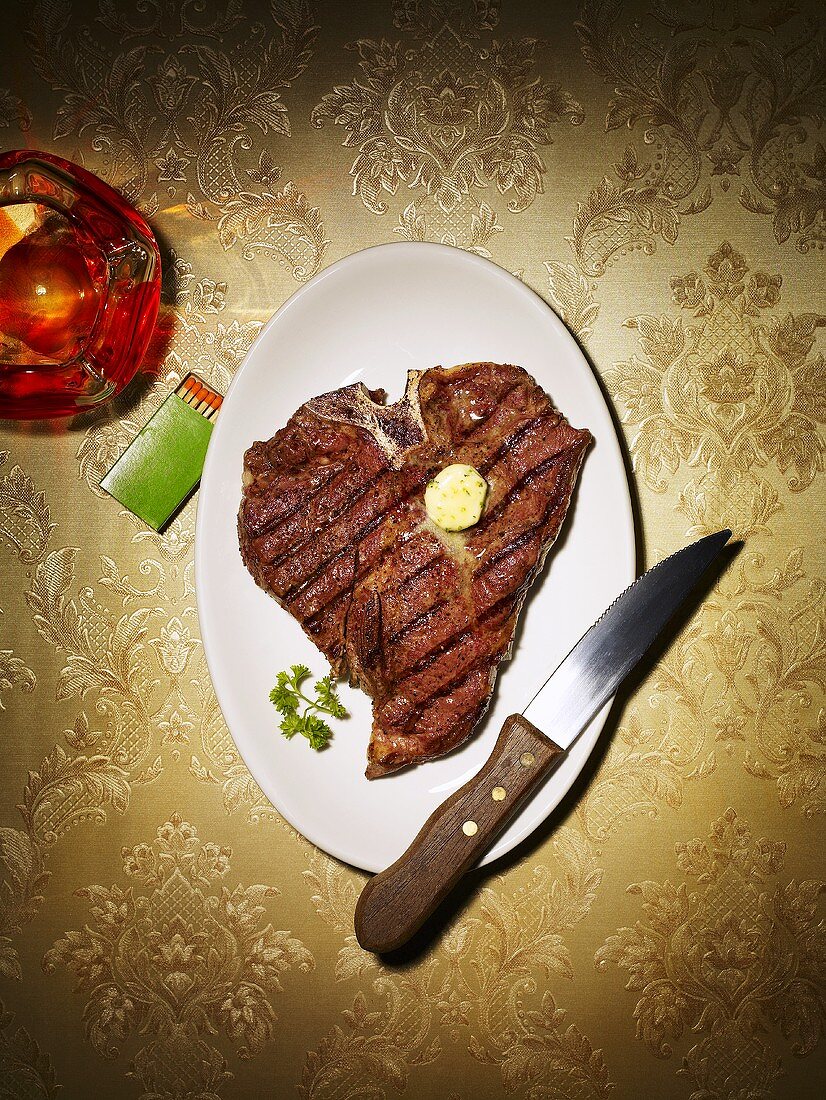 T-bone steak with herb butter