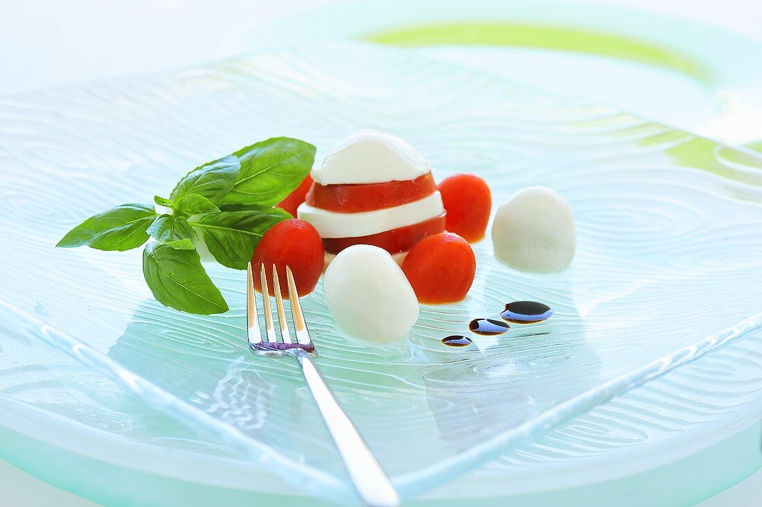 Tomatoes and mozzarella with basil
