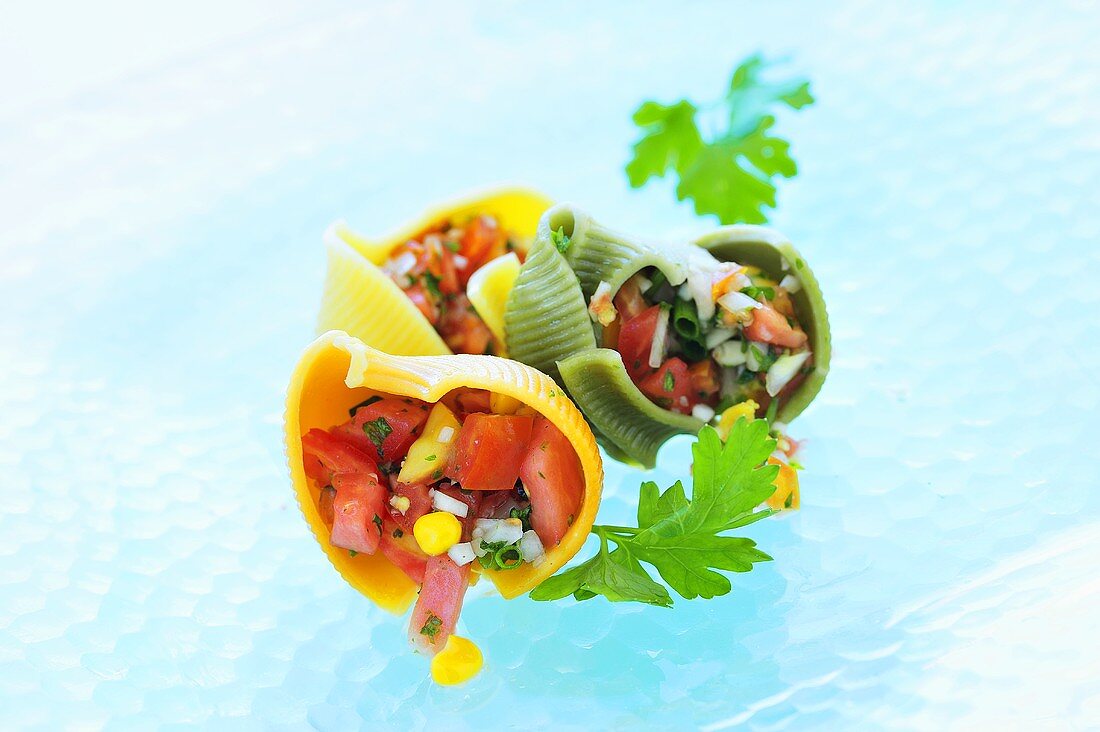 Lumaconi filled with tomato and sweetcorn salad