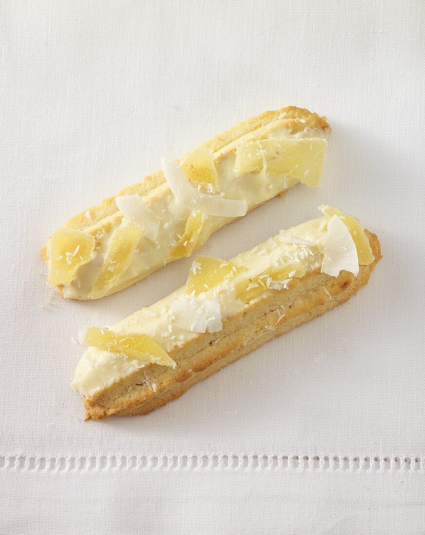 Viennese fingers with candied pineapple and coconut