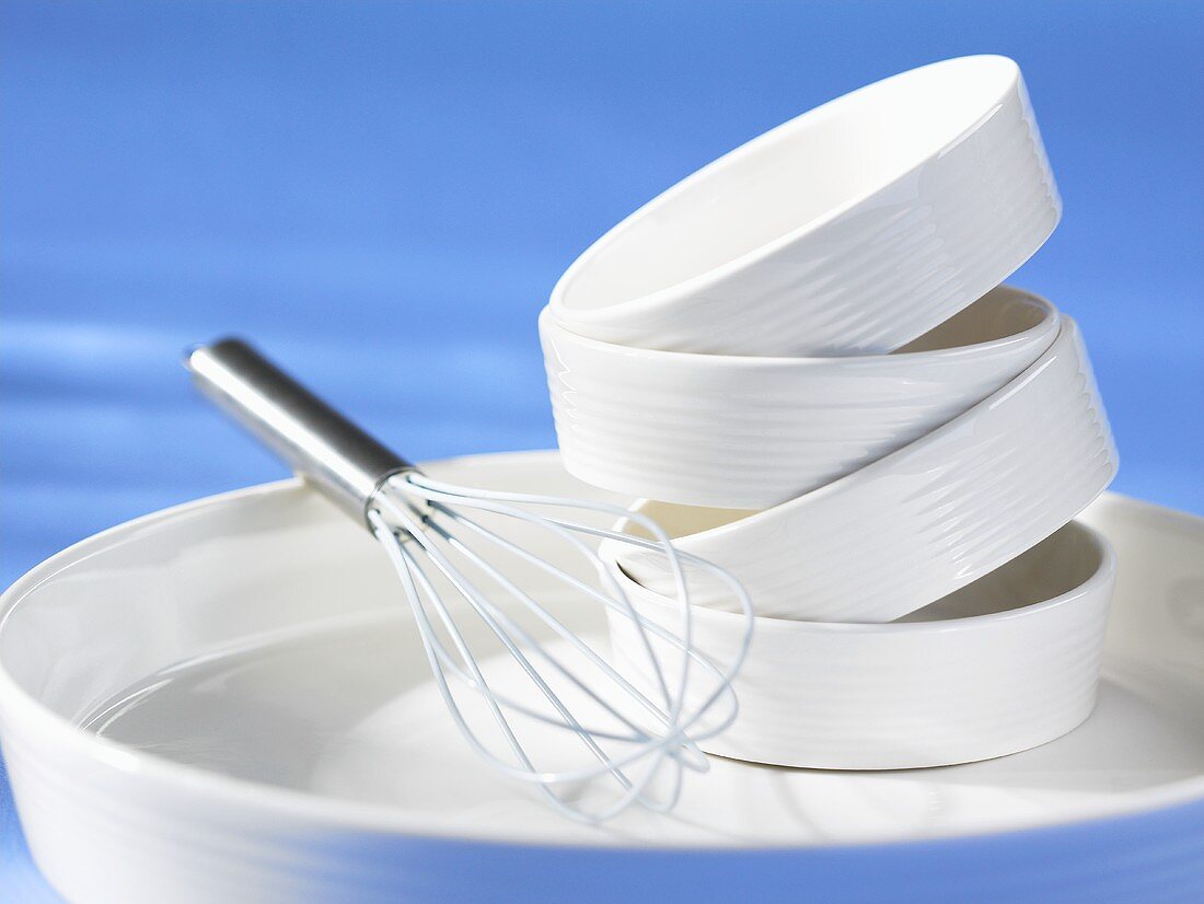 Porcelain dishes and whisk