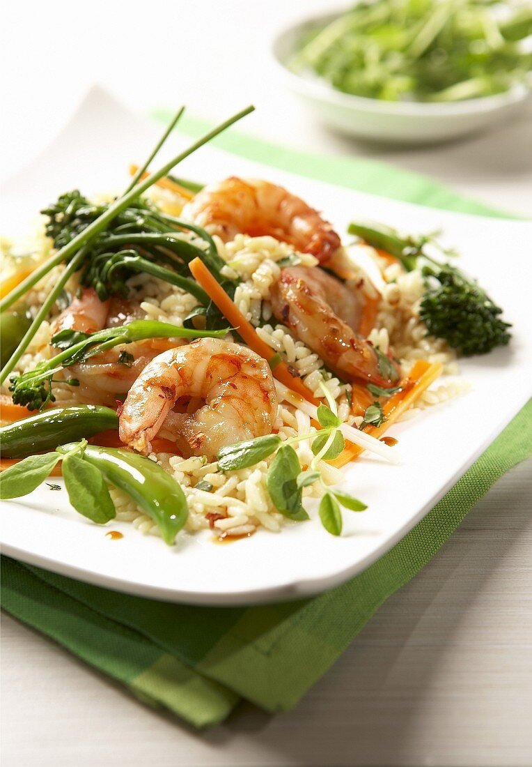 Prawn and vegetable stir-fry on rice