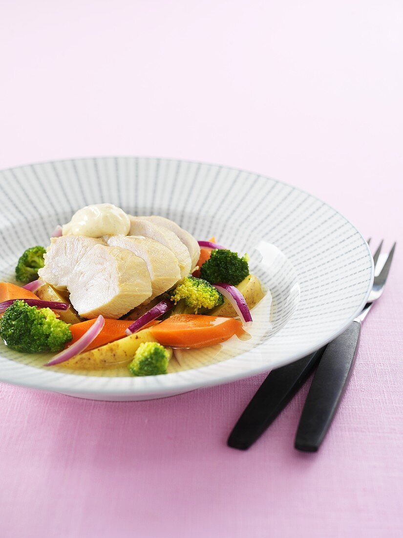 Chicken with cooked vegetables