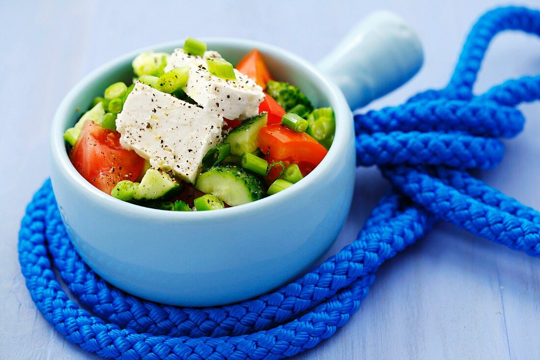 Cucumber and tomato salad with sheep's cheese