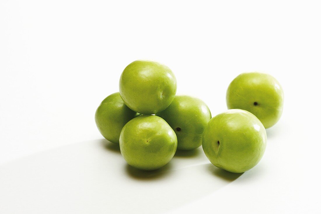 Several green plums (variety: Canerik, Turkish plums)