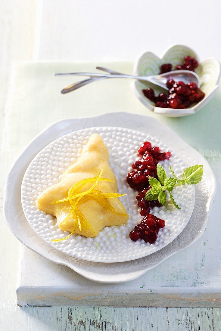 A tree-shape in semolina with cranberries