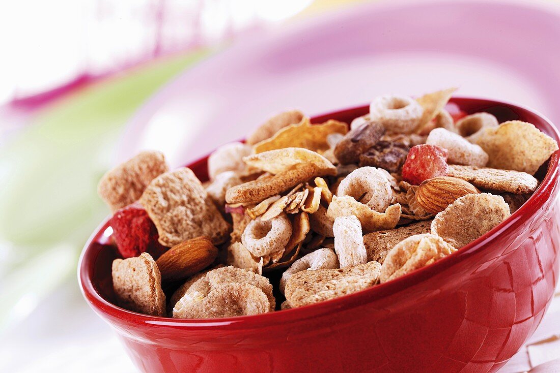 Muesli with dried fruit and almonds in a bowl