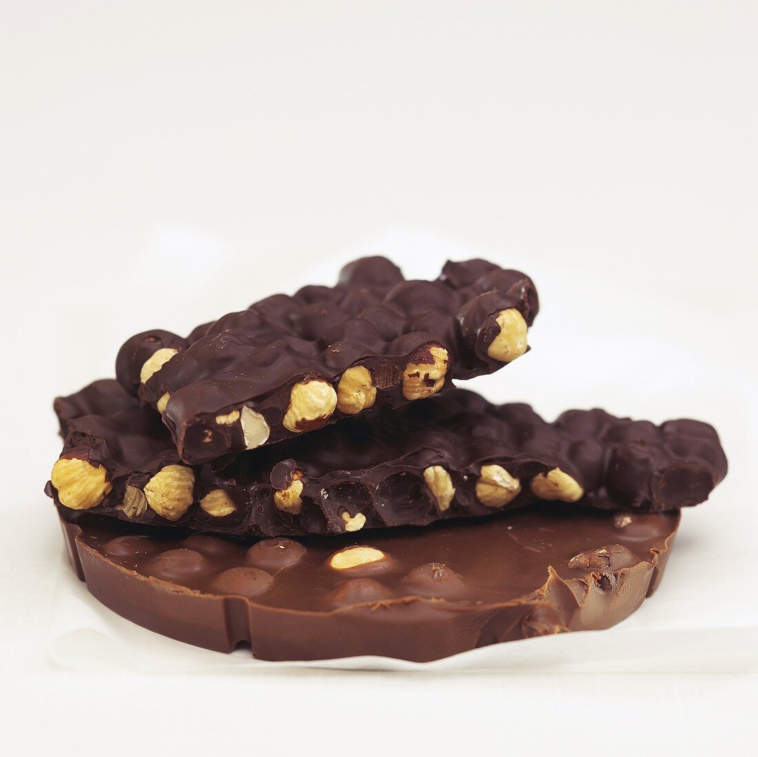 Chocolate with hazelnuts, close-up