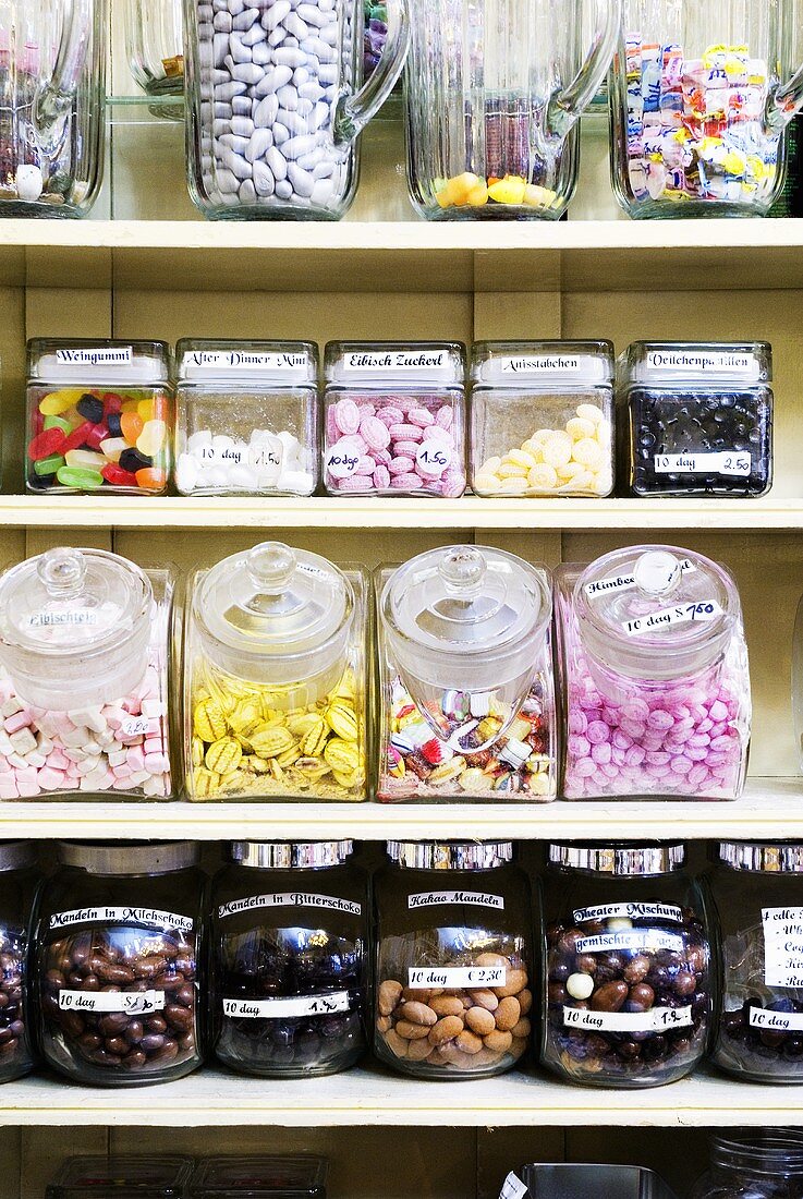 Assorted sweets on shelves in a sweet shop