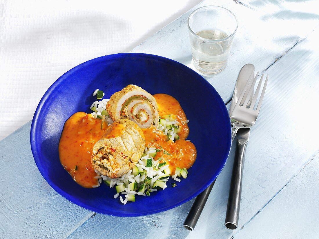 Pork roulades with sheep's cheese filling, tomato sauce & rice
