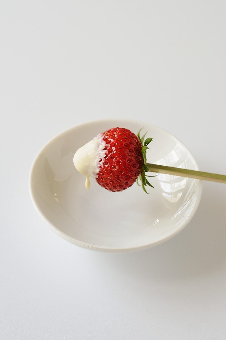 Strawberry dipped in crème fraîche