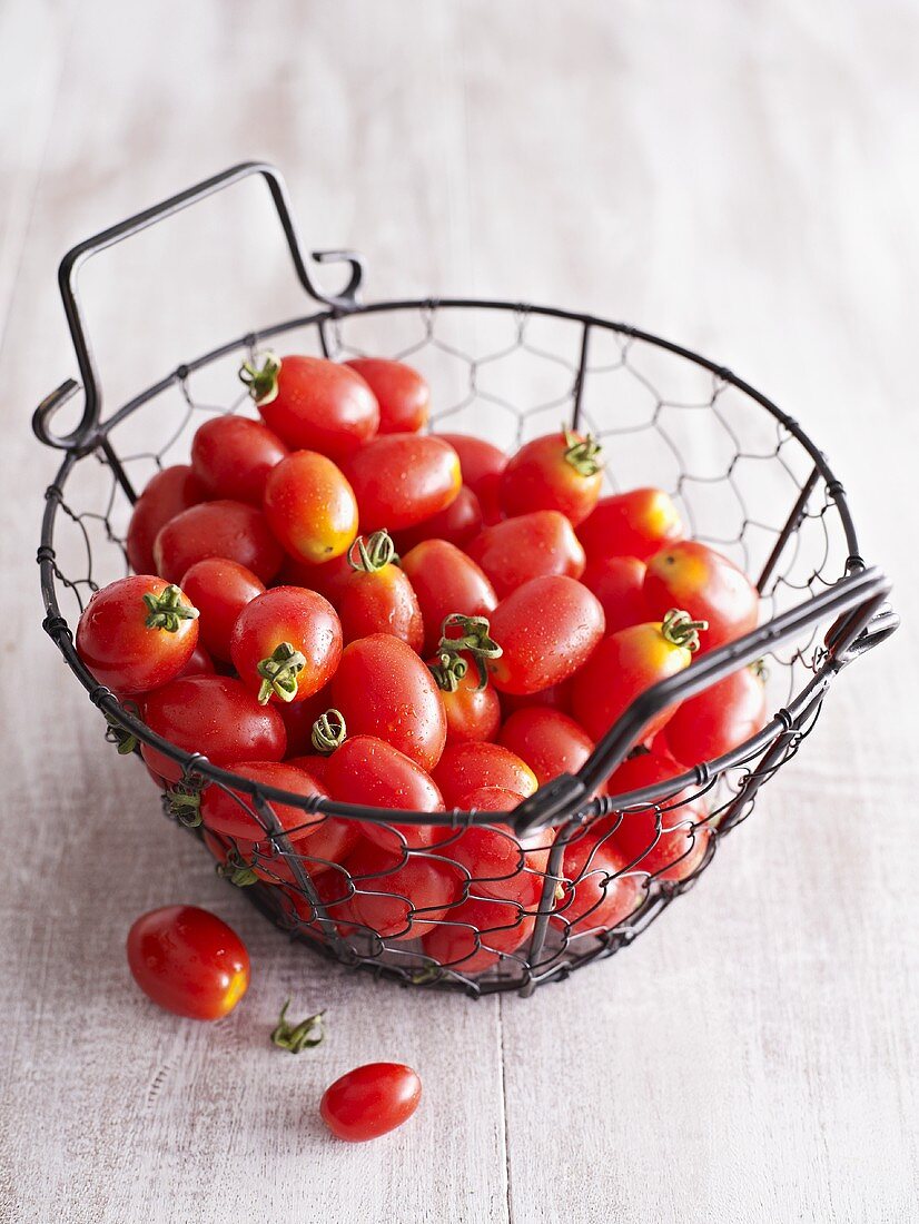 Cherry tomatoes in a wire basket