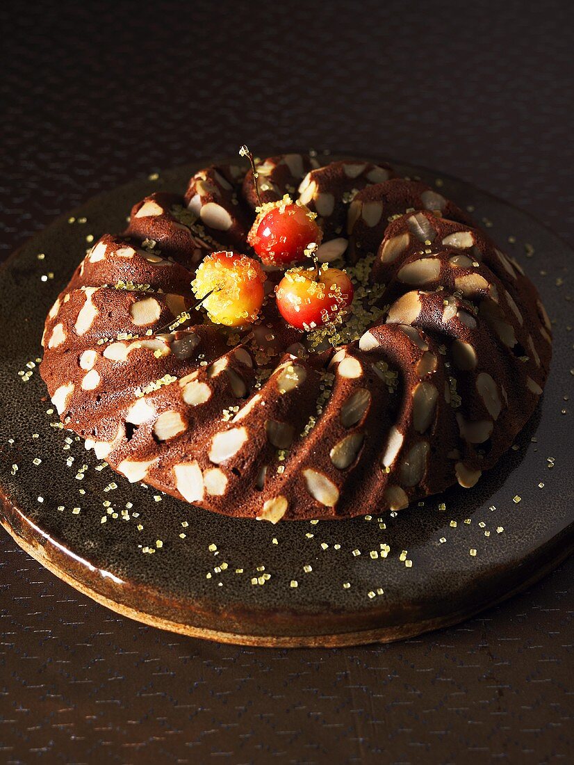 Chocolate ring cake with flaked almonds