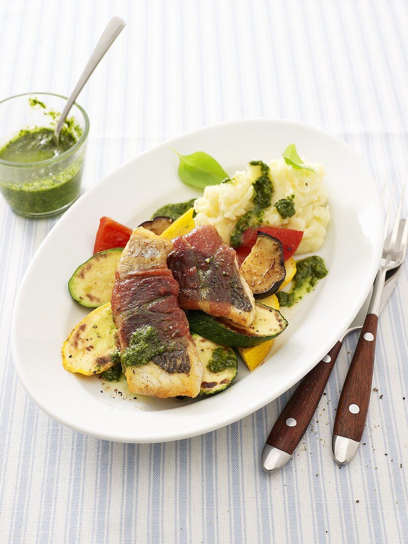 Saltimbocca of sea bream with mashed potato, pesto & vegetables